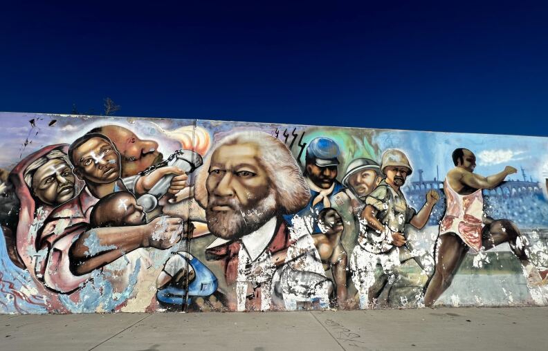 A section of a mural on a wall. 
