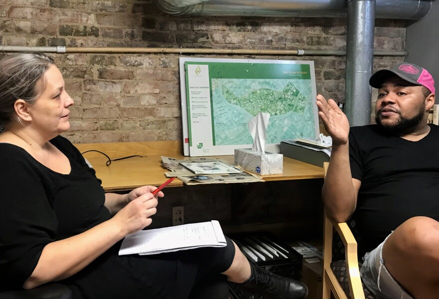 Deep Ellum archivist Cathryn Colcer interviews Dallas singer-performer Dezi 5 in the Deep Ellum Community Foundation offices.jpg