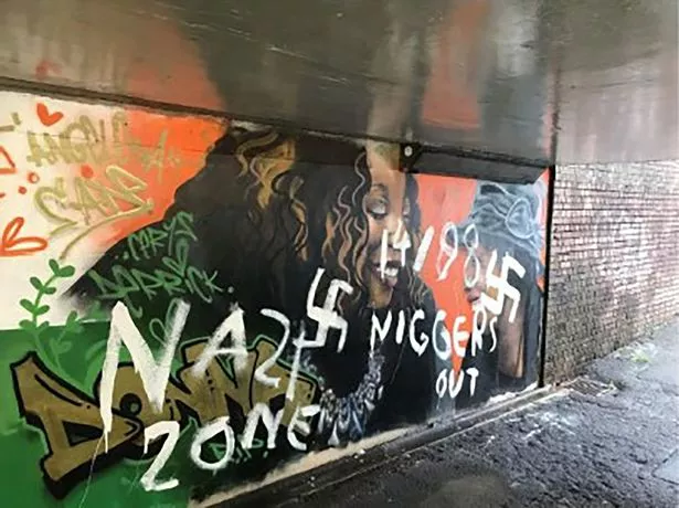 The racist graffiti daubed on a Windrush mural in Port Talbot by Haynes