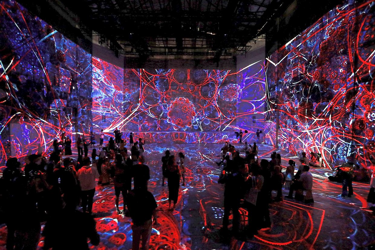 Digital art installation 'Foreign Nature' by Julius Horsthuis and Ben Lukas Boysen lights up the new RXP.KL immersive gallery space at REXKL. Photo: The Star/Yap Chee Hong