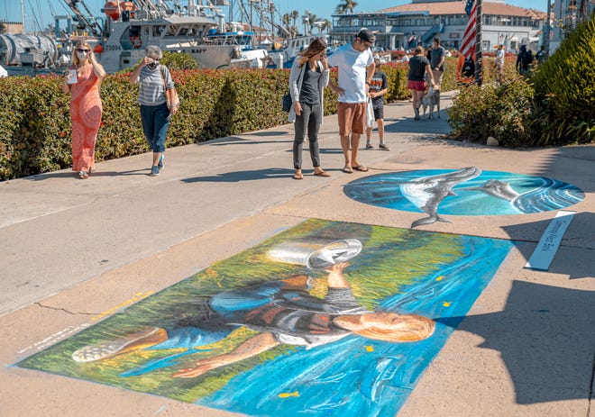 Attendees check out street paintings at the 2021 Ventura Art & Street Painting Festival.