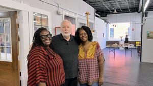From left, artist Semeion Richardson, the CEO and founder of Artist with a Purpose, meets with Leesburg Center for the Arts Executive Director Richard Colvin and Artist with a Purpose assistant director Belina Wright.
