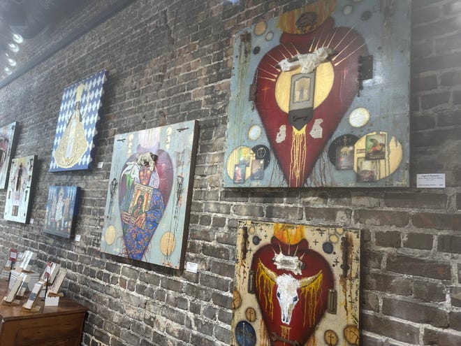 Artwork by Hector Boldo and Jacqueline Wooton is on display at Main Street Gallery in downtown Hattiesburg, Miss., during the show's opening reception Saturday, Sept. 2, 2023.