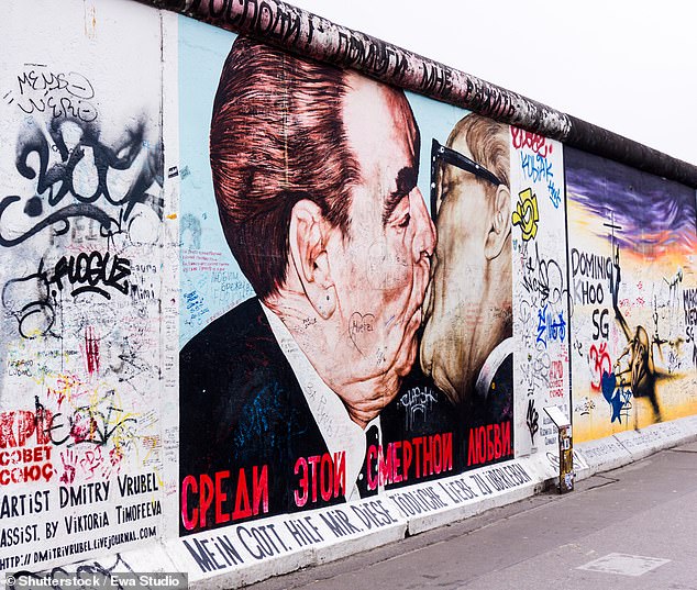 Go on a street art tour and marvel over the East Side Gallery (above), a section of the Berlin Wall that has been embellished with murals