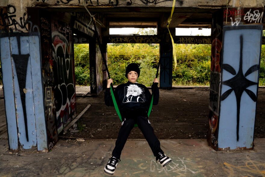 Leo Gilbert, 12, of Kirkwood, launches in a makeshift swing on Sunday, Oct. 8, 2023, during the Artica Urban Art Festival along the Mississippi Riverfront in downtown St. Louis.