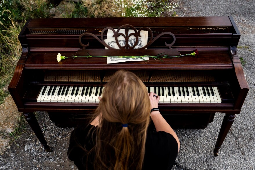 Alec Kiello, 29, of Bella Villa, plays the piano on Sunday, Oct. 8, 2023, during the Artica Urban Art Festival along the Mississippi Riverfront in downtown St. Louis. “This festival is fantastic,” he said. “It’s free and open to everyone. The art is just incredible.”