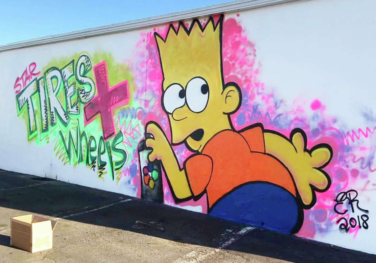 Meriden artist, hairstylist and hip-hop musician Eddie Rivera recently completed a portion of a giant, floral-themed mural in the back alleyway of 418-20 Main St. in Middletown. Shown here is Bart Simpson.