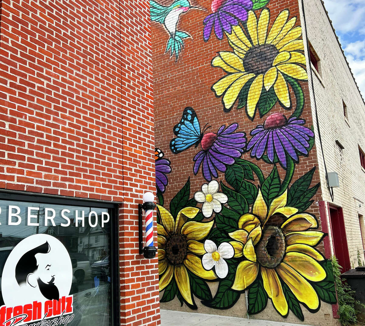 Artist Eddie Rivera of Meriden painted this floral mural in the alleyway between 418 and 420 Main St. in Middletown. It's seen from the downtown Melilli Plaza parking area.