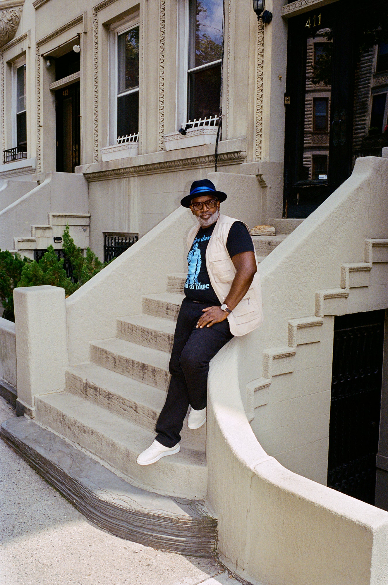 Brathwaite on the steps of his Sugar Hill town house once a hangout for the likes of W.E.B. Du Bois and Billie Holiday....