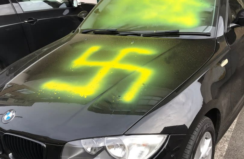 Swastika found painted on the hood of BMW in Bristol, England on Yom Kippur. (credit: WORLD ZIONIST ORGANIZATION)
