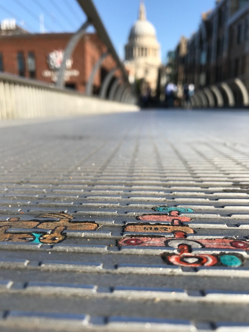 A view along millennium bridge with st pauls behind