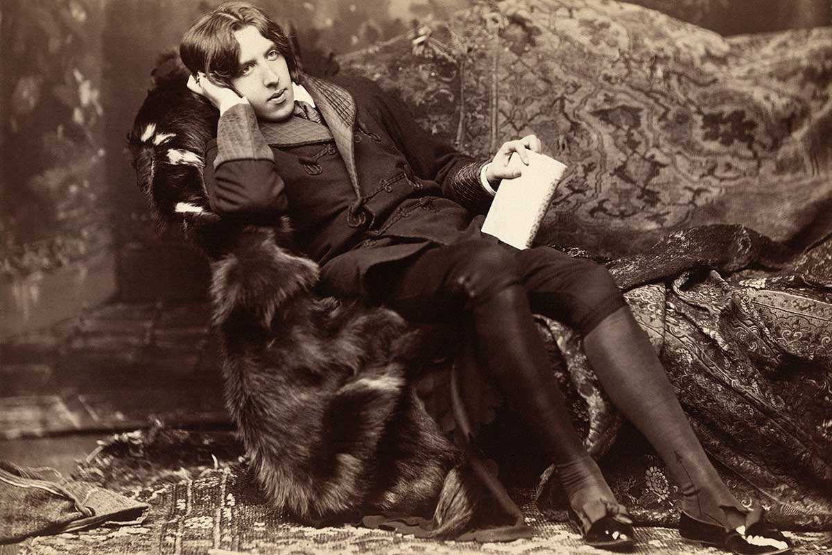 A photographic print of Oscar Wilde on card mount, by Napoleon Sarony (1882)