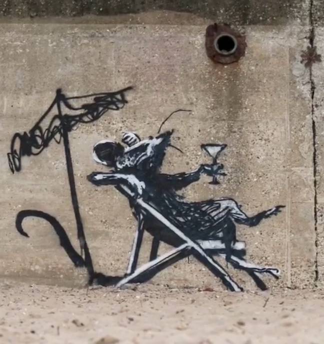 One of Banksy's pieces, which appeared at the bottom of Links Hill in North Beach, Lowestoft, depicts a rat reclining in a deckchair with a cocktail in its hand. Credit: Instagram/@Banksy