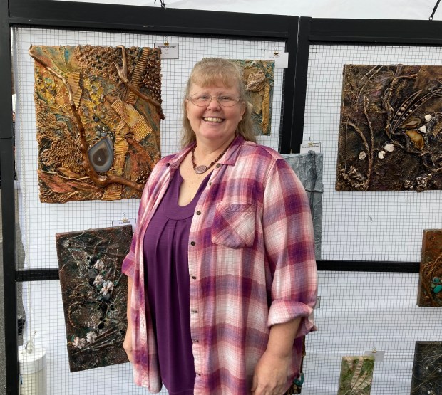 Jennifer Hershberger showcases her assemblage art, highlighting a piece made...