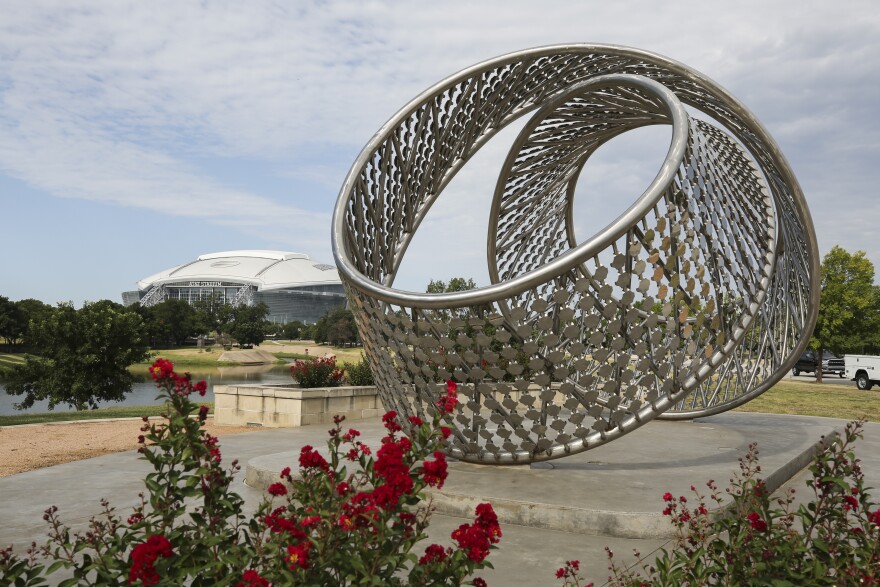 Unity Arch by Owen Morrel along the Entertainment District Sculpture Trail at Richard Greene Linear Park in Arlington.
