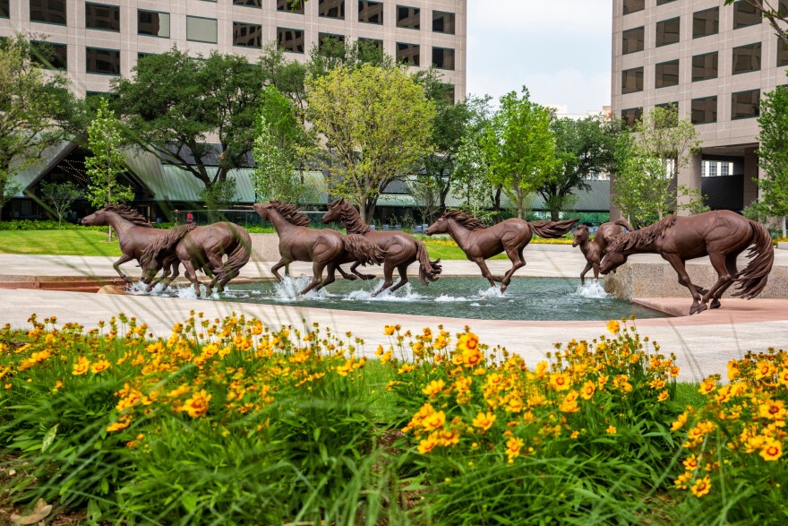 The Mustangs at Las Colinas are the centerpiece of Williams Square, a plaza in the Las Colinas Urban Center.