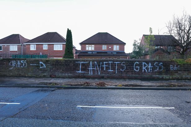 Graffiti on Muirhead Avenue East, near to the entrance to Croxteth Hall Country Park, labelling Ian Fitzgibbon a 