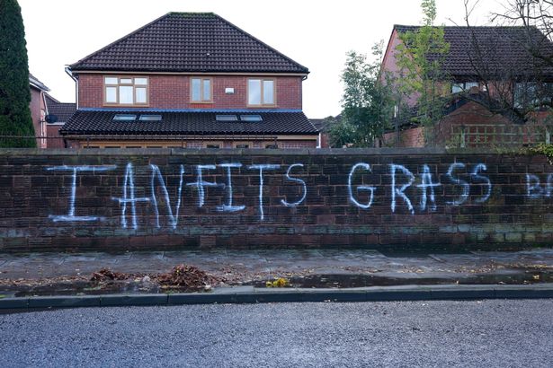 Graffiti on Muirhead Avenue East, near to the entrance to Croxteth Hall Country Park, labelling Ian Fitzgibbon a 