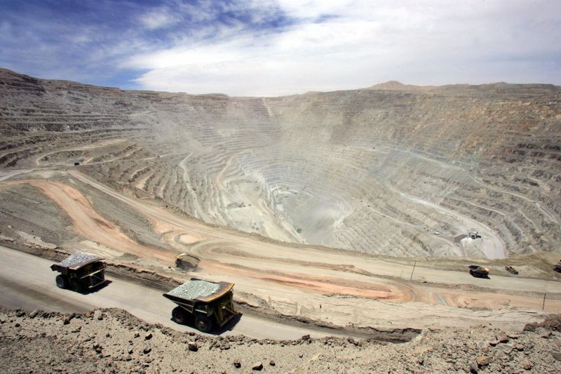 A view of giant Komatsu trucks arriving with loads at the Chuquicamata copper mine, in the Atacama Desert of Chile.