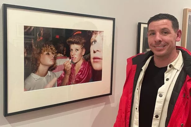Chris Thompson at the Photie Man exhibition in Liverpool's Walker Art Gallery alongside a Tom Wood photograph of his late mum Tracey. November 16, 2023