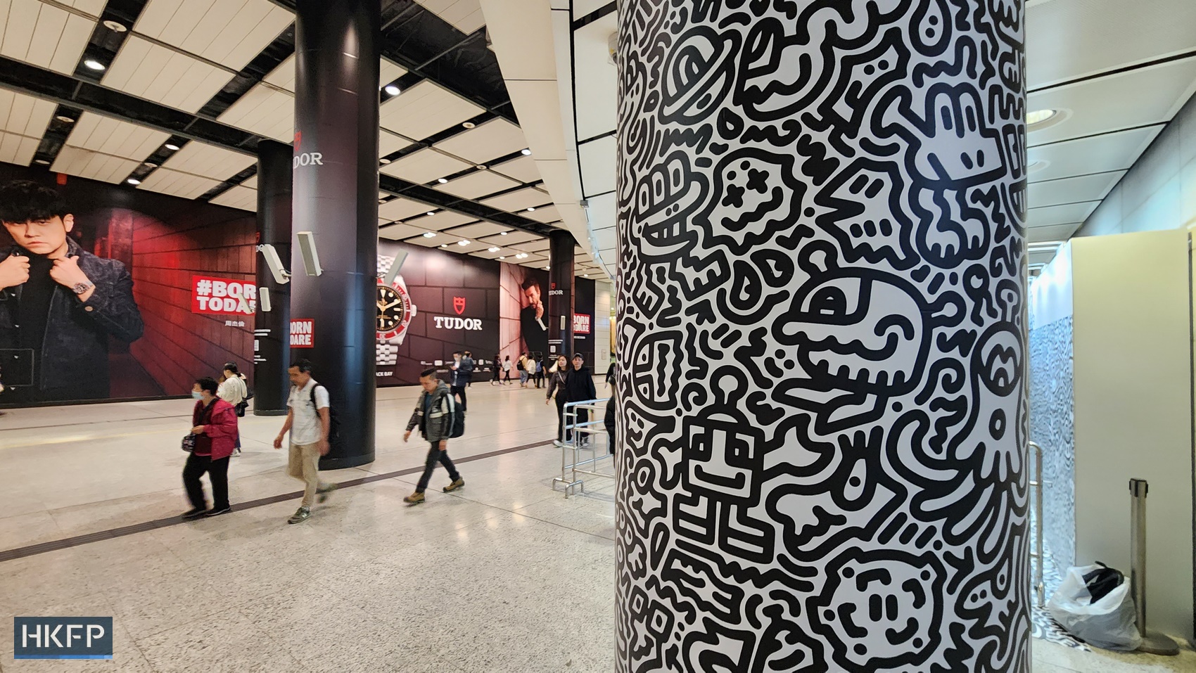 Drawings by British artist Sam Cox, better known as Mr. Doodle, installed at an MTR station in Central district on November 19, 2023. Photo: Tom Grundy/HKFP.