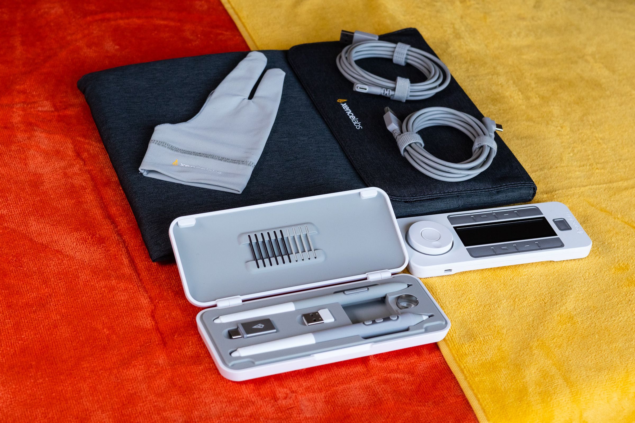 The pens, glove, storage case, cables, and Quick Keys accessory for the Xencelabs Pen Tablet.