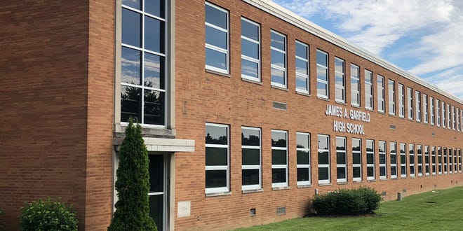 The investigation into threatening graffiti at James A. Garfield High School, shown here, has been concluded, with the responsible student identified.