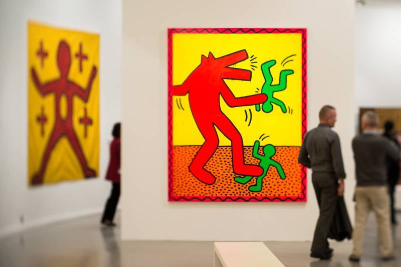 A Keith Harring painting at Musee d'Art Moderne in Paris, France. Getty