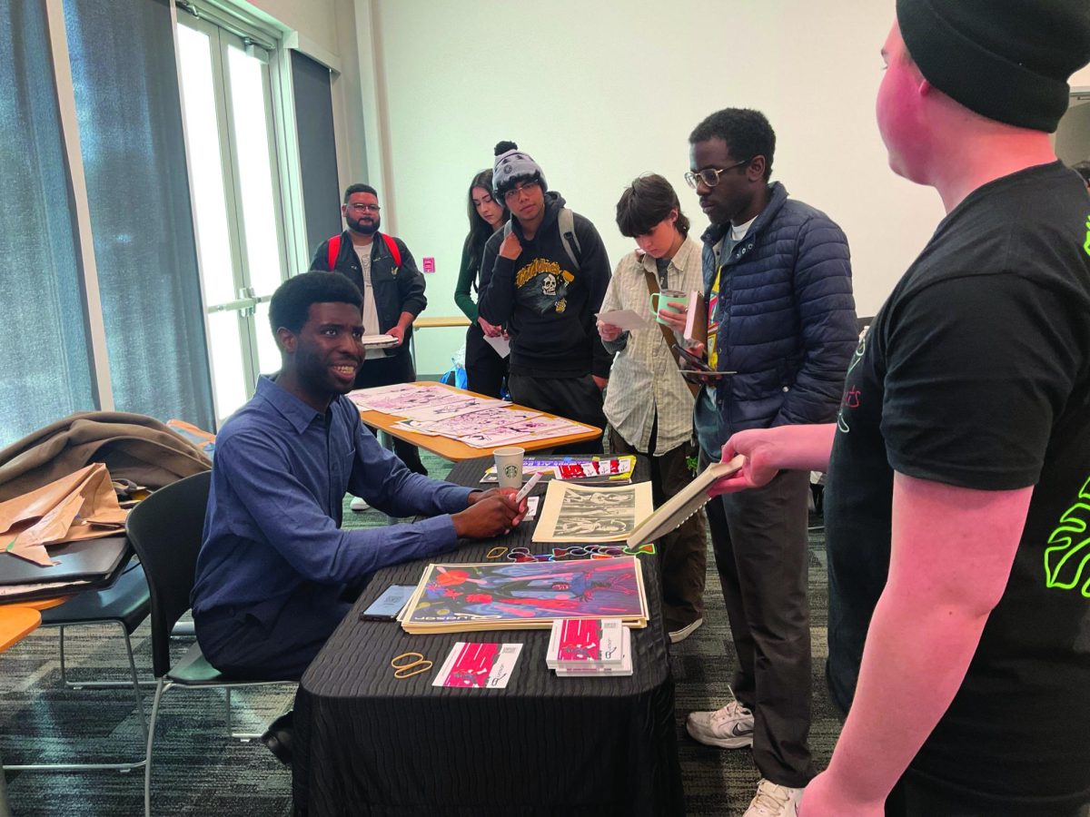 Nigerian+artist+Gideon+Egbuchlam+answers+questions+from+students+after+his+presentation+in+the+Student+Union.