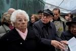 French nazi hunter Serge Klarsfeld, center right, and Auschwitz concentration camp survivor Esther Senot, left, attend a gathering in the Paris Holocaust memorial to sound the alarm about resurgent antisemitic hate speech, graffiti and abuse linked to the Israel-Hamas war, in Paris, Saturday, Nov. 18, 2023. rance's Interior Ministry said this week that 1,762 antisemitic acts have been reported this year, as well as 131 anti-Muslim acts and 564 anti-Christian acts.