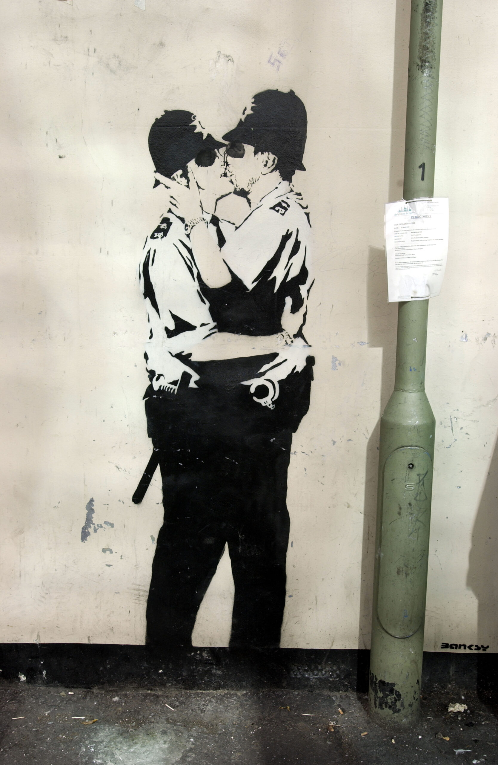 'Kissing Coppers' was daubed on a wall in Brighton