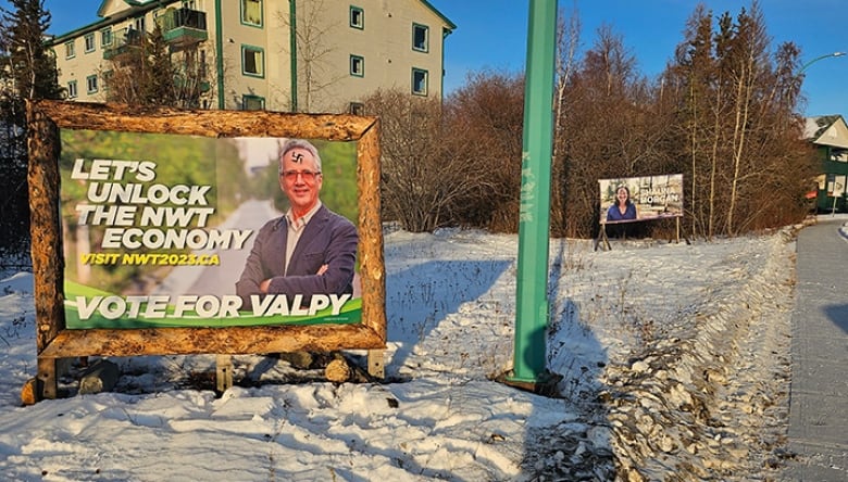 election sign snow graffiti