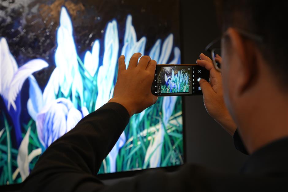 Exhibition merges traditional art with digital techniques