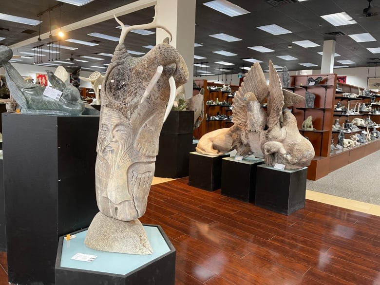two large sculptures made of bone
