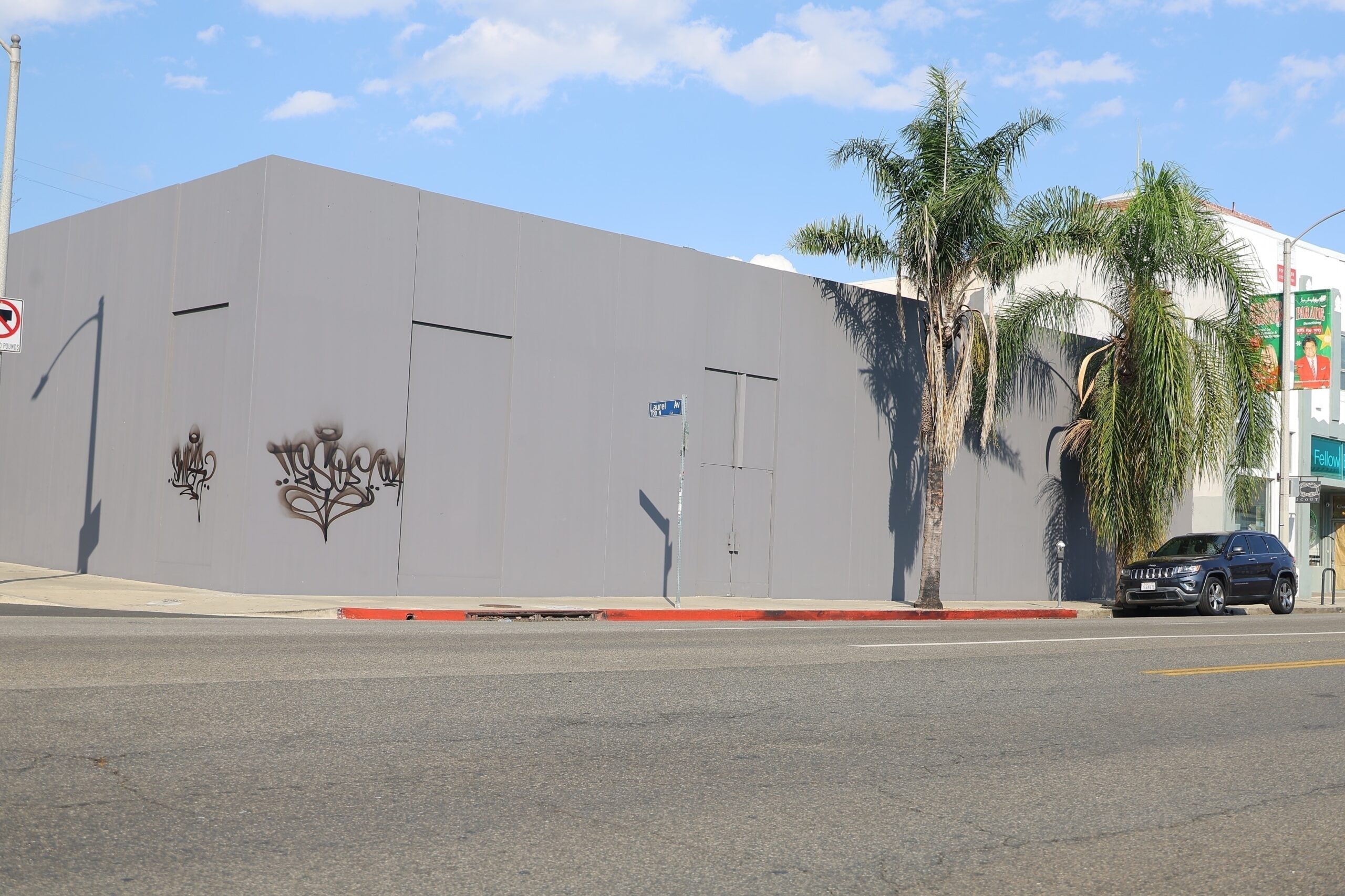 Kanye West remains overseas and his Yeezy HQ has now become an eyesore for neighbors in Los Angeles