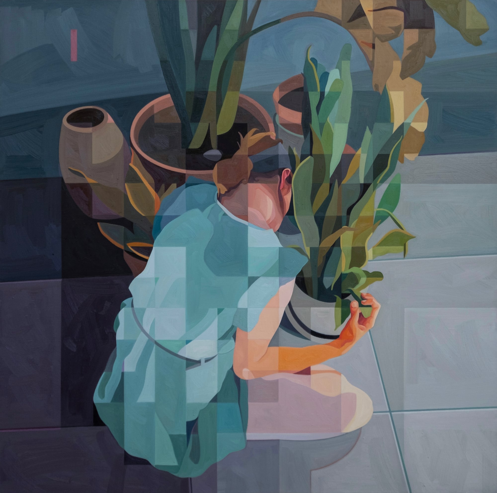 a woman's back is turned to the viewer as she grasps a potted plant on the floor
