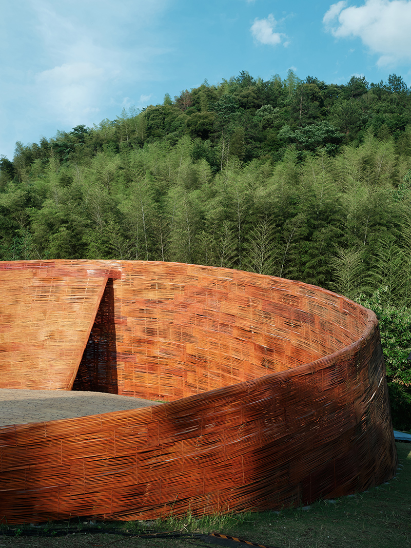 SODA architects plants bamboo stage installation amid mountains for qingshan art season