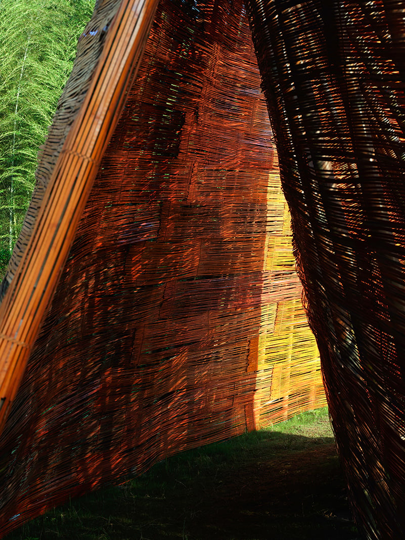 SODA architects plants bamboo stage installation amid mountains for qingshan art season