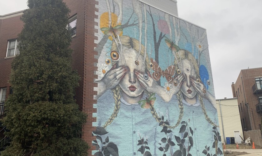 Chloe Becky — who works under the name Elsie the Cowww — painted this mural on Avondale Avenue in Logan Square.