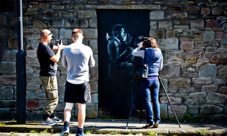 People photograph and film Mobile Lovers in 2014.
