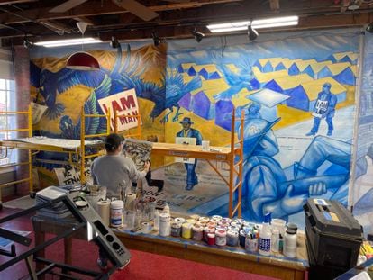 Artist Toria Maldonado works on a section of ‘The Great Wall of Los Angeles’ at the Social and Public Art Resource Center (SPARC) in Venice, Los Angeles.