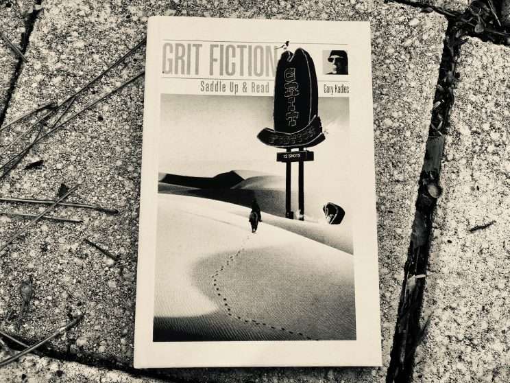 A book on a background of pavers titled