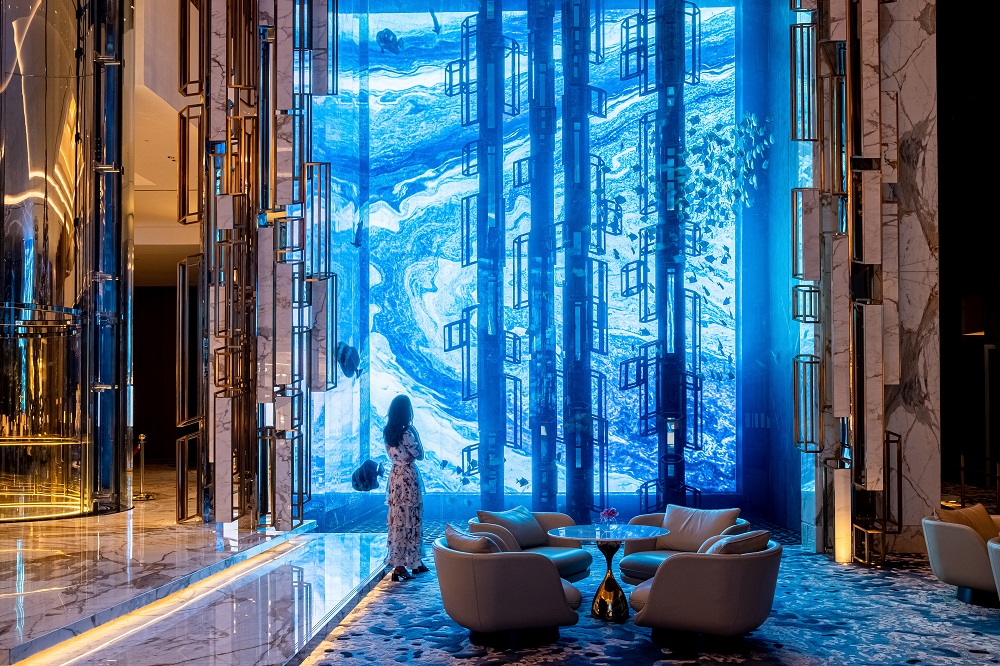 Samsung LED signage behind lobby fish tanks