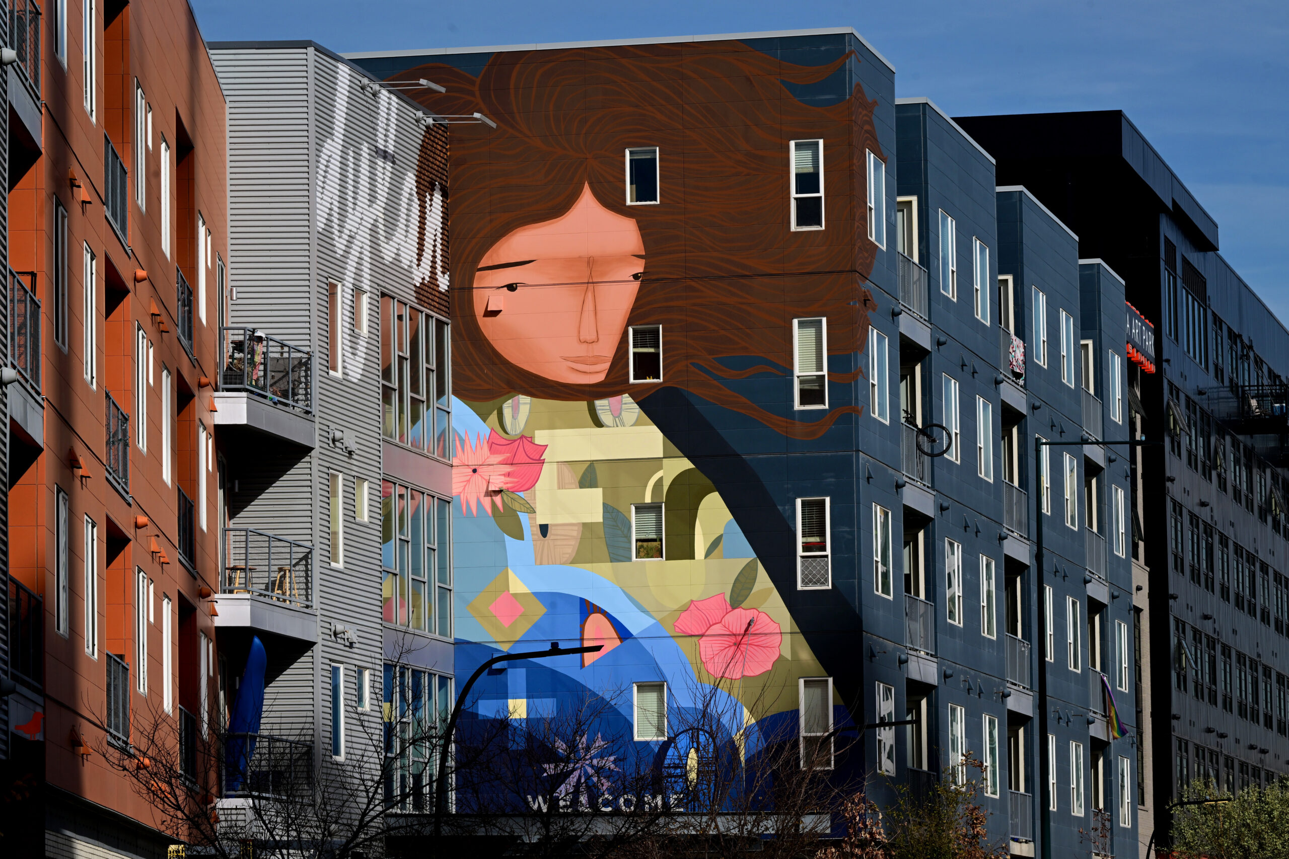 A four story, large scale project by Muralists Jaime Molina and Pedro Barrios along Brighton Blvd on Nov. 13, 2023 in Denver.