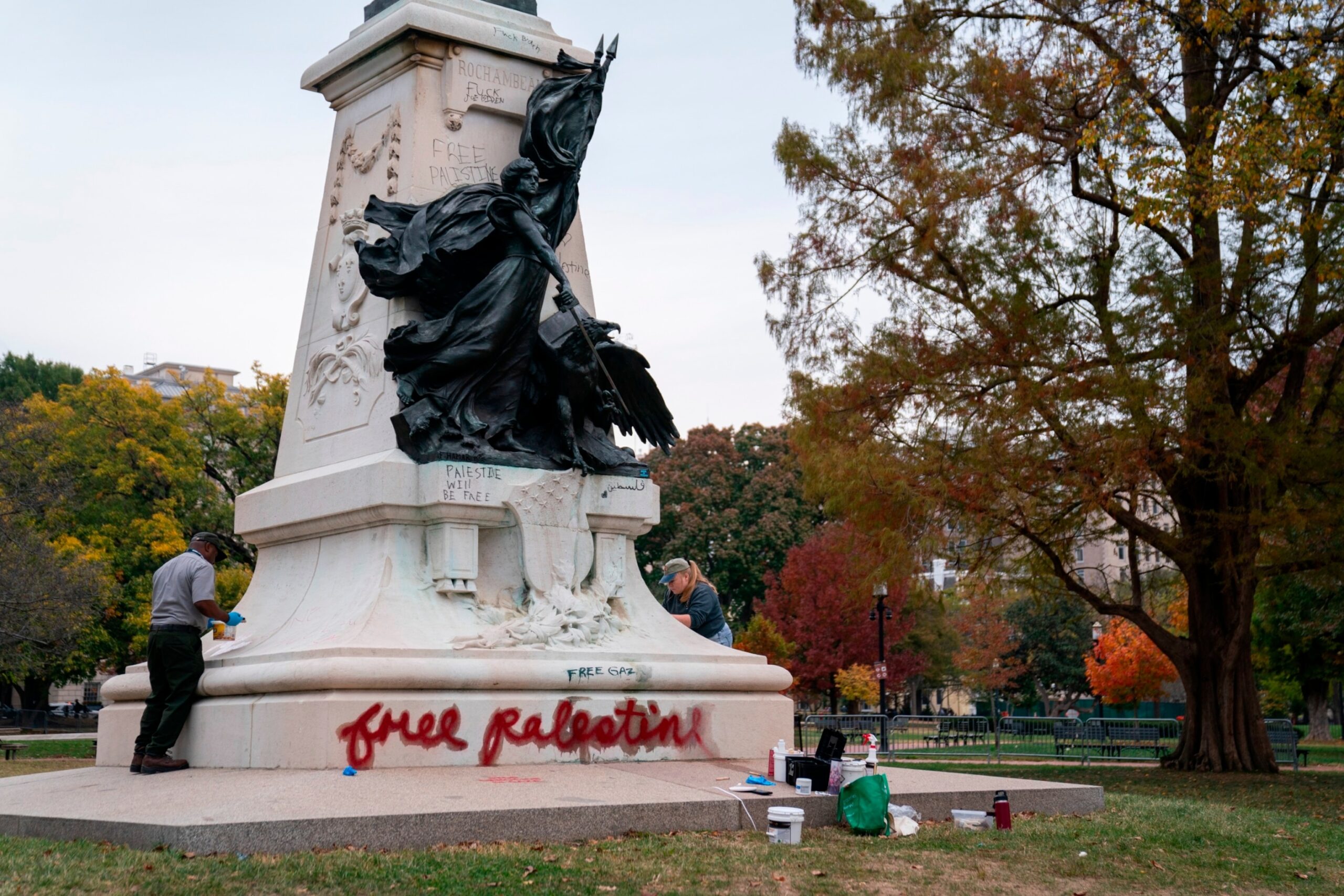 PHOTO: Workers remove graffiti from a statue in Lafayette Park left by demonstrators over the weekend demanding a cease-fire in the Israel-Hamas war, Nov. 7, 2023, in Washington.