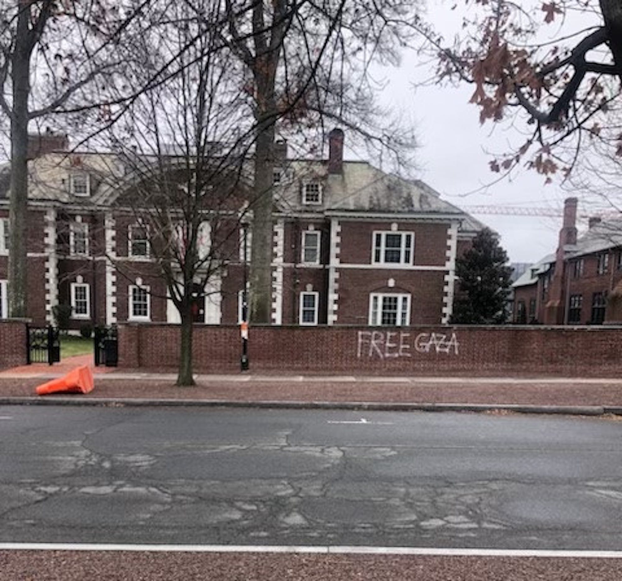 A brick wall with the words