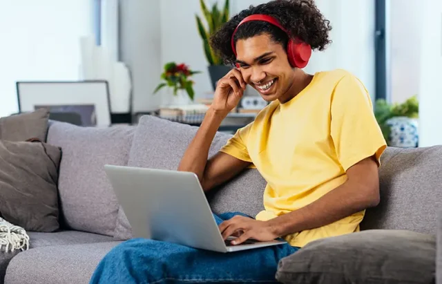 young-boy-working-relaxed-on-his-computer-from-hom-2023-11-27-05-33-07-utc copy