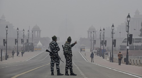 Security personnel stand guard at Kartavya Path
