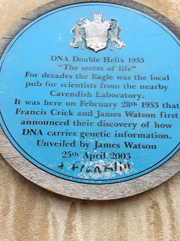 The plaque outside The Eagle, commemorating Crick and Watson's discovery of the structure of DNA, which was changed to include Rosalind Franklin's name in 2017