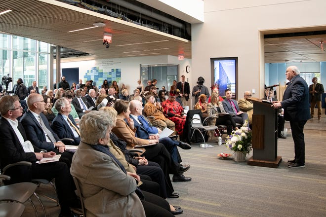 Framingham Mayor Charlie Sisitsky greets attendees during the ribbon cutting ceremony for the Center for Health Sciences, Early Childhood and Human Services at MassBay Community College on Franklin Street in Framingham, Jan. 30, 2024.
